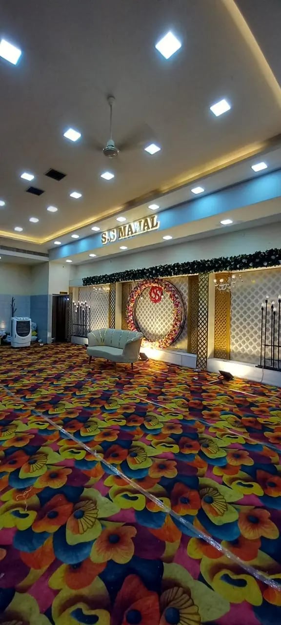 Colourful carpet to the stage at S.S Mahal